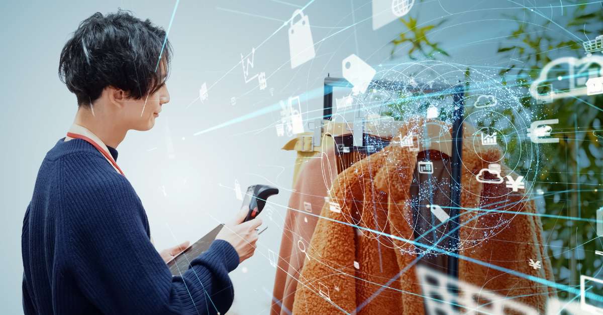 Man views holographic depictions of cloud data in front of a retail store. 